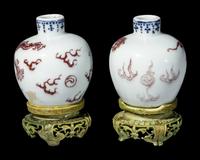 A Pair of Chinese Copper-Red Decorated Blue and White Miniature Jars