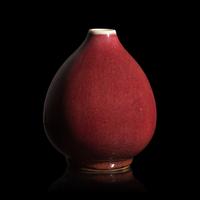 A Chinese Copper Red Glazed Porcelain Bud-Form Jar, 18th Century — 清中期 銅紅釉蓮子罐