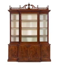 A Late George III Pierce Carved and Figured Mahogany Breakfront Cabinet