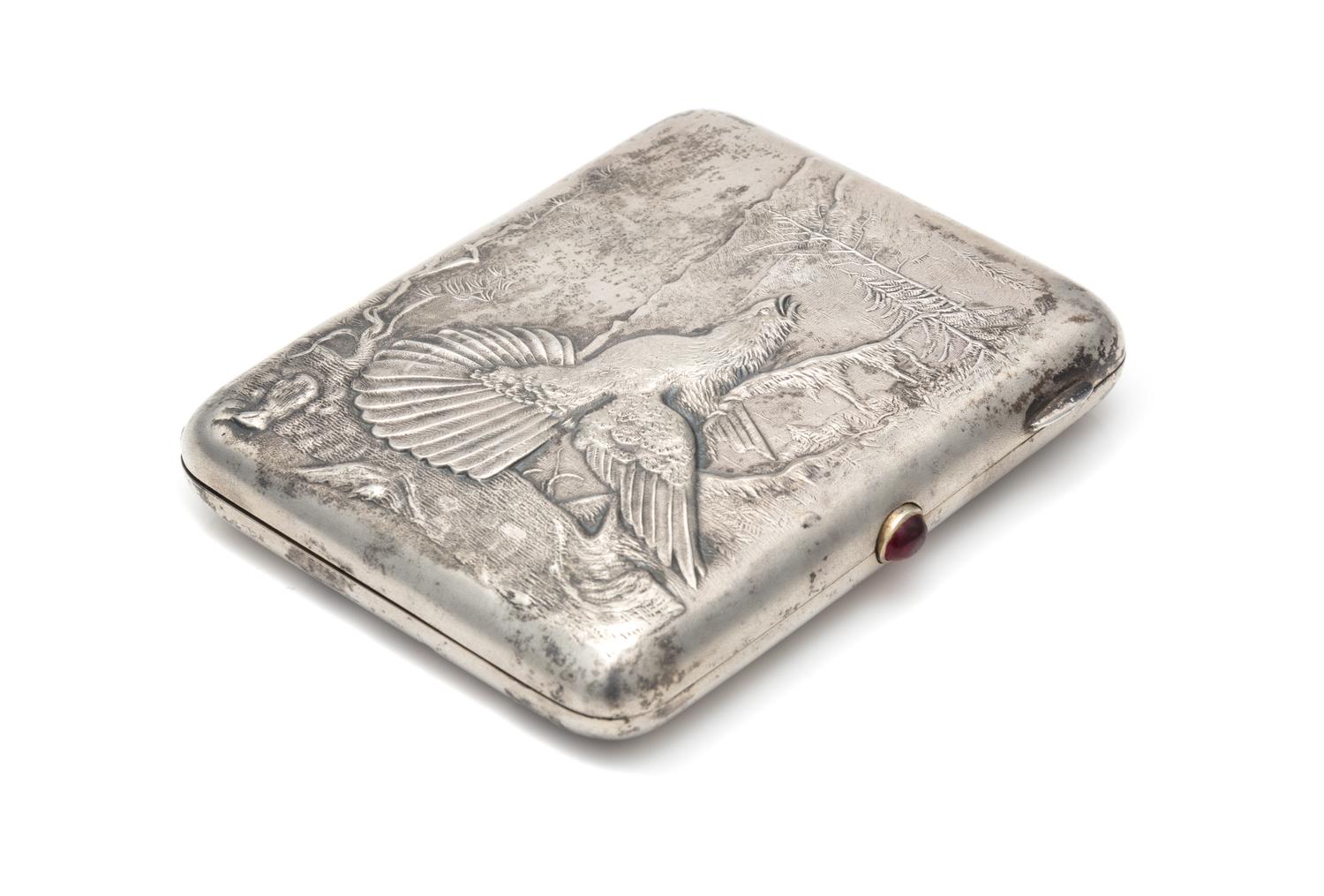 A Soviet-Era Russian Silver Cigarette Case, Maker's Mark MIP9, Moscow, 20th Century, the repousse lid worked to show a capercaillie in