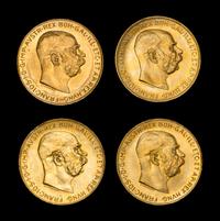 A Set of Four Austrian 100 Corona Gold Coins