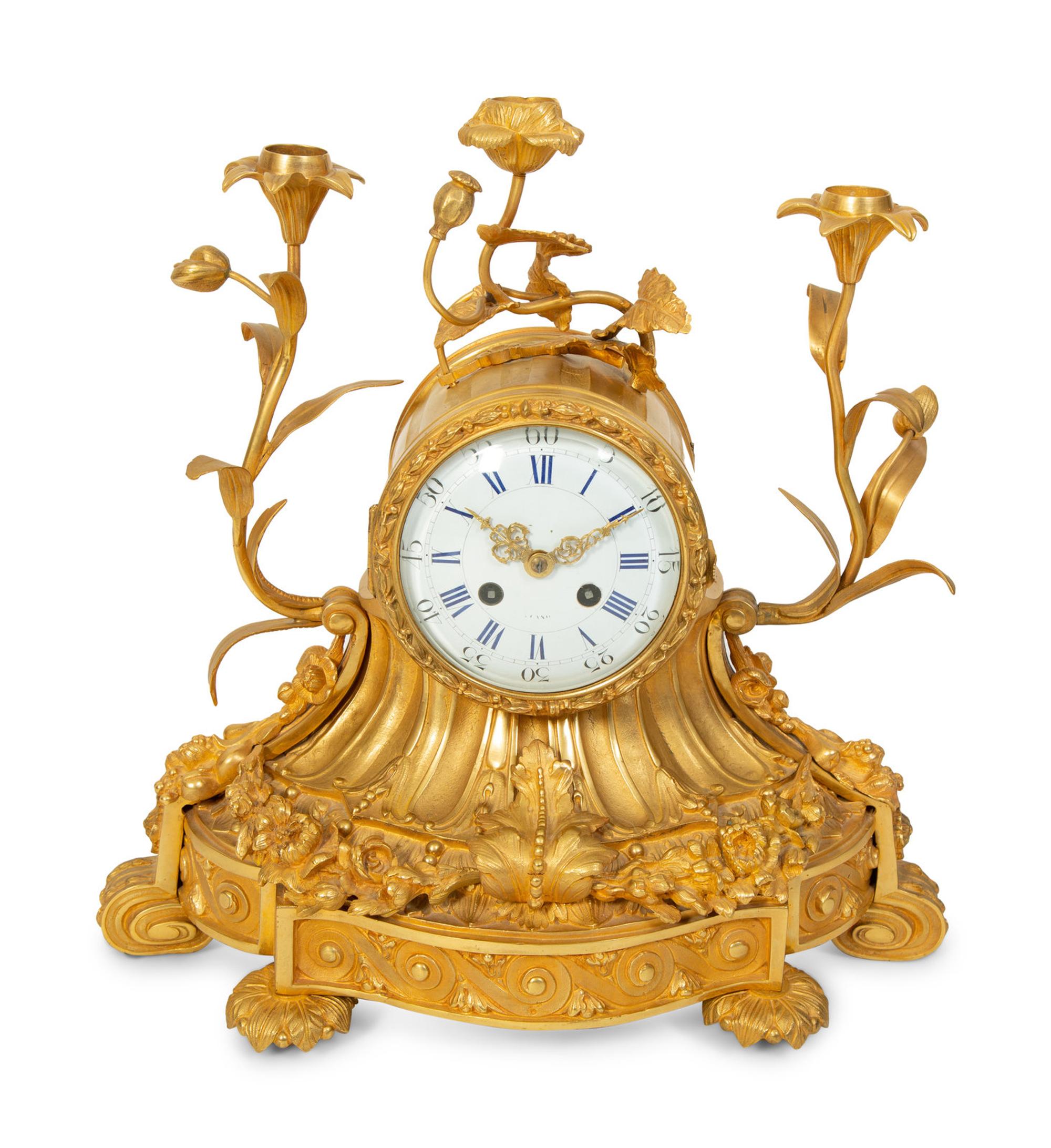 A Napoleon III Gilt Bronze Mantle Clock — 19TH CENTURY