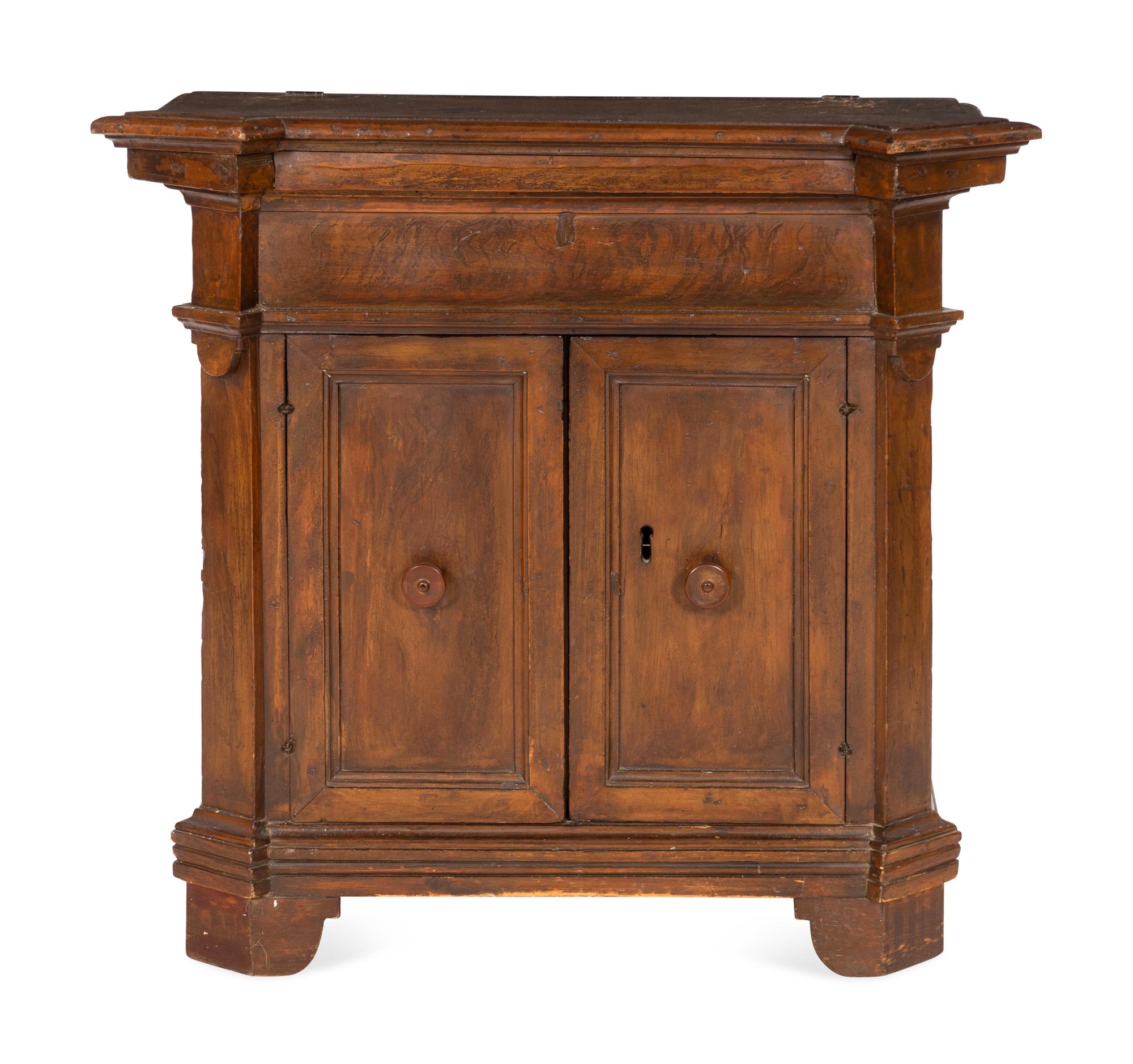 An Italian Baroque Walnut Cabinet