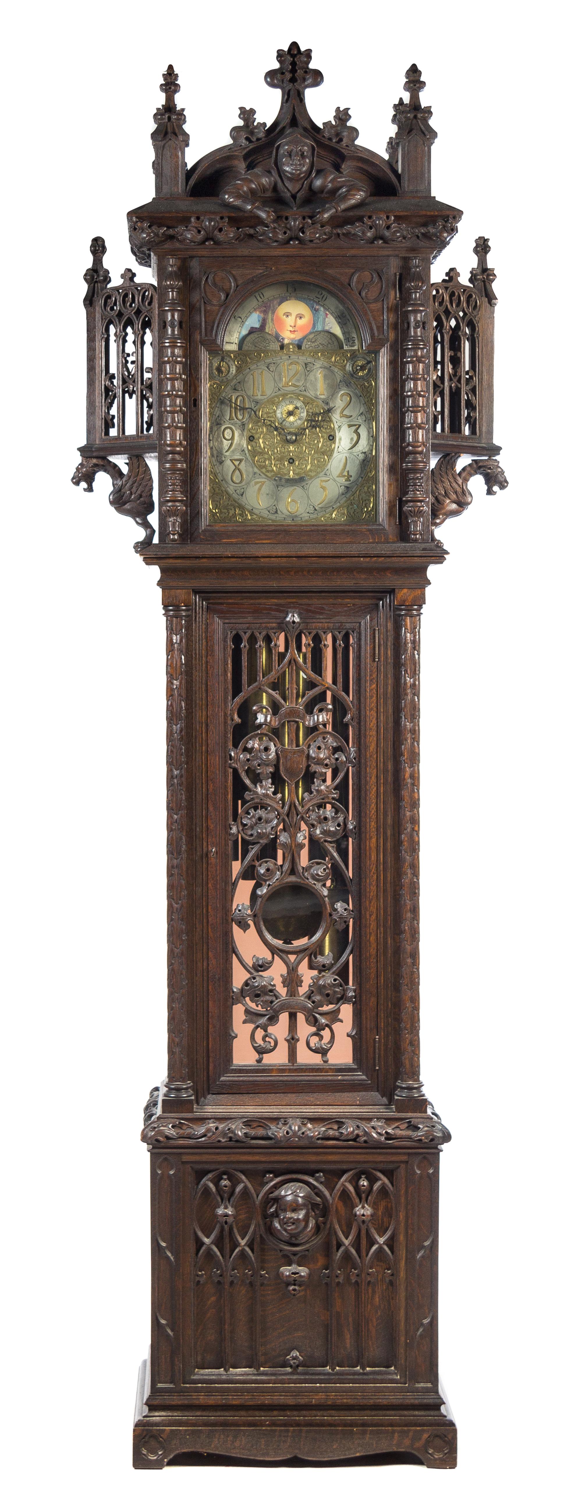 An English Gothic Revival Tall Case Clock Height 107 3/4 x width 34 1/8 x depth 17 1/2 inches. — RETAILED BY TIFFANY & CO., MOVEMENT BY ELLIOTT, CIRCA 1900