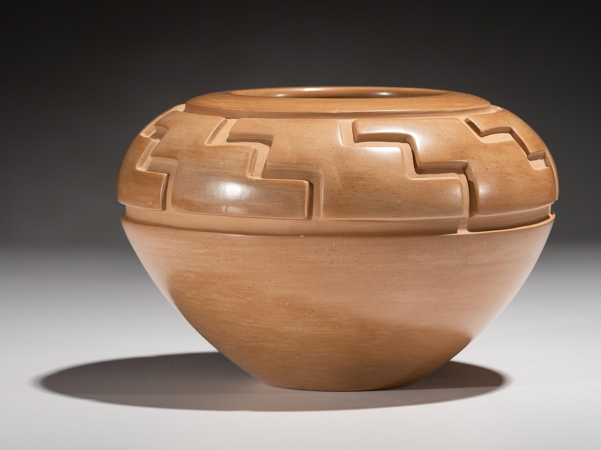 Carved Buffware Pottery Jar