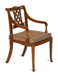 A Regency Style Rosewood and Parcel Gilt Open Armchair