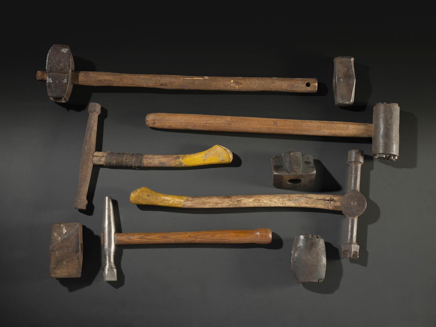 Nine Cast Iron Logging Stamps and Hammers