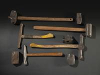 Nine Cast Iron Logging Stamps and Hammers