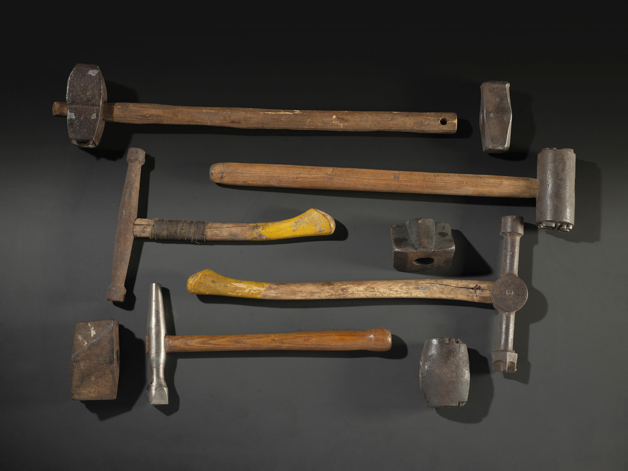 Nine Cast Iron Logging Stamps and Hammers