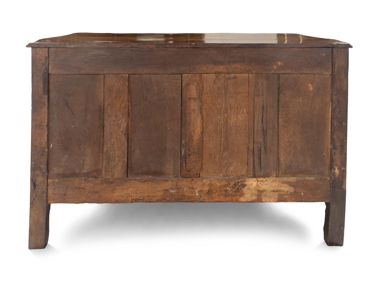A Louis XV Walnut Serpentine Front Commode