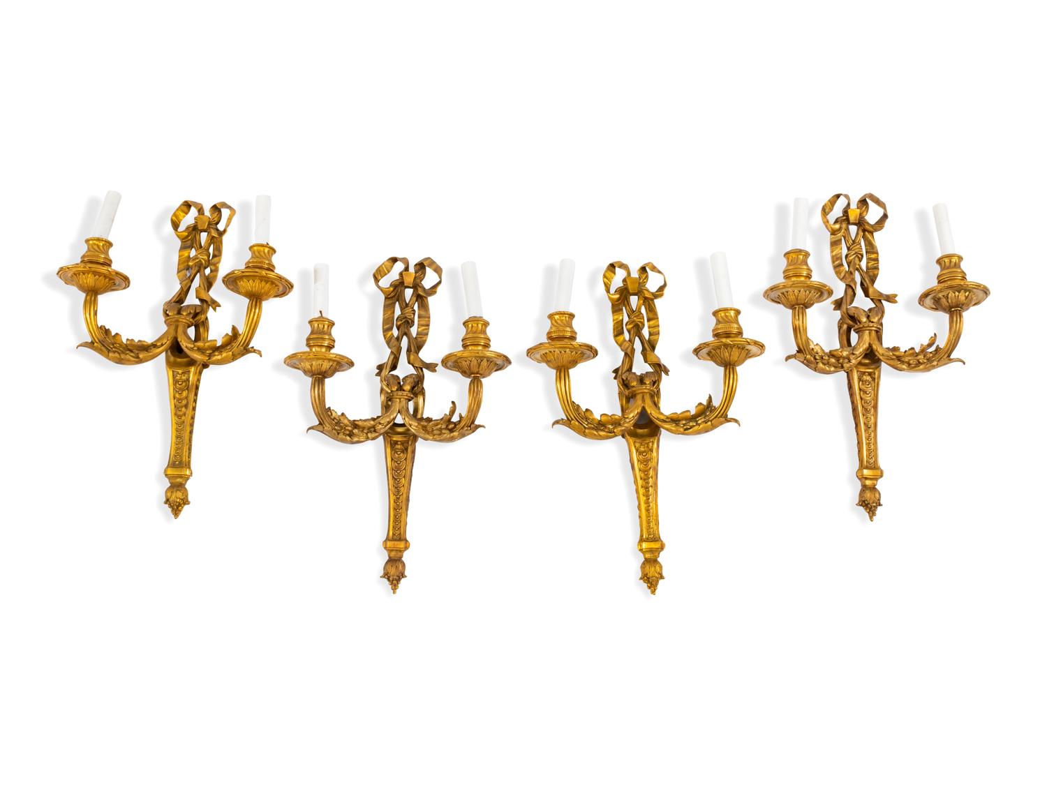 A Set of Four Louis XV Style Gilt Bronze Two-Light Sconces