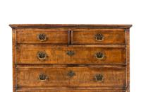 A George II Walnut Chest of Drawers