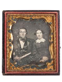 [EARLY PHOTOGRAPHY]. Sixth plate daguerreotype of a man holding a telescope, seated next to his wife.