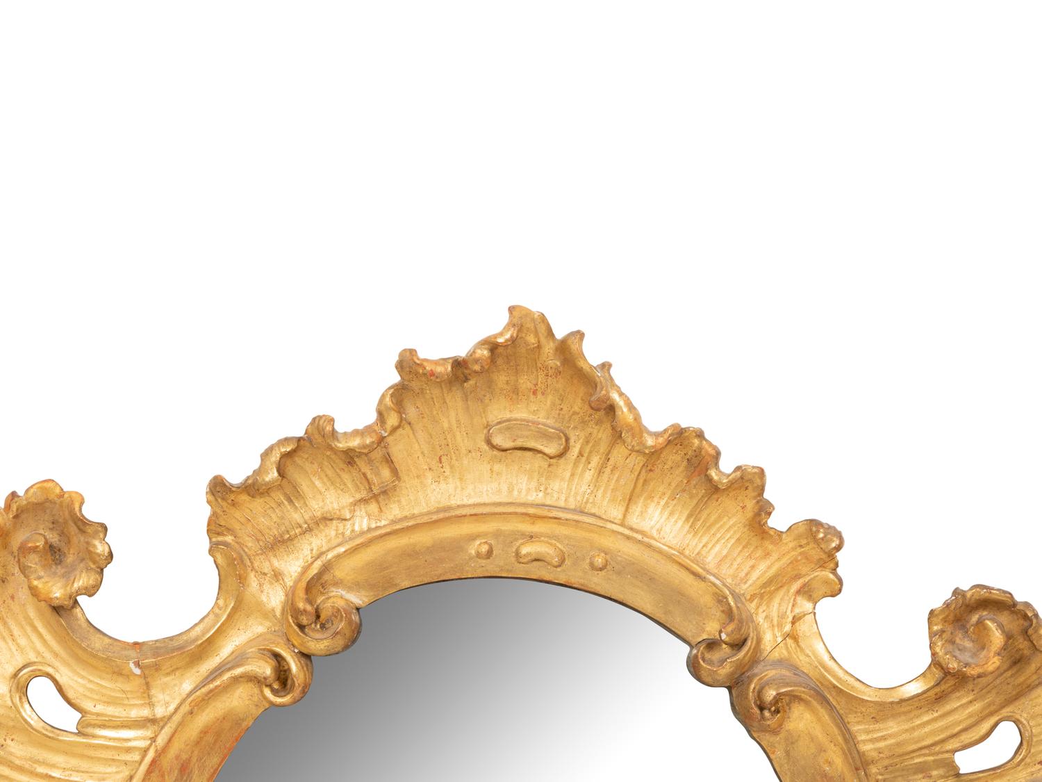A Italian Giltwood Cartouche Form Mirror