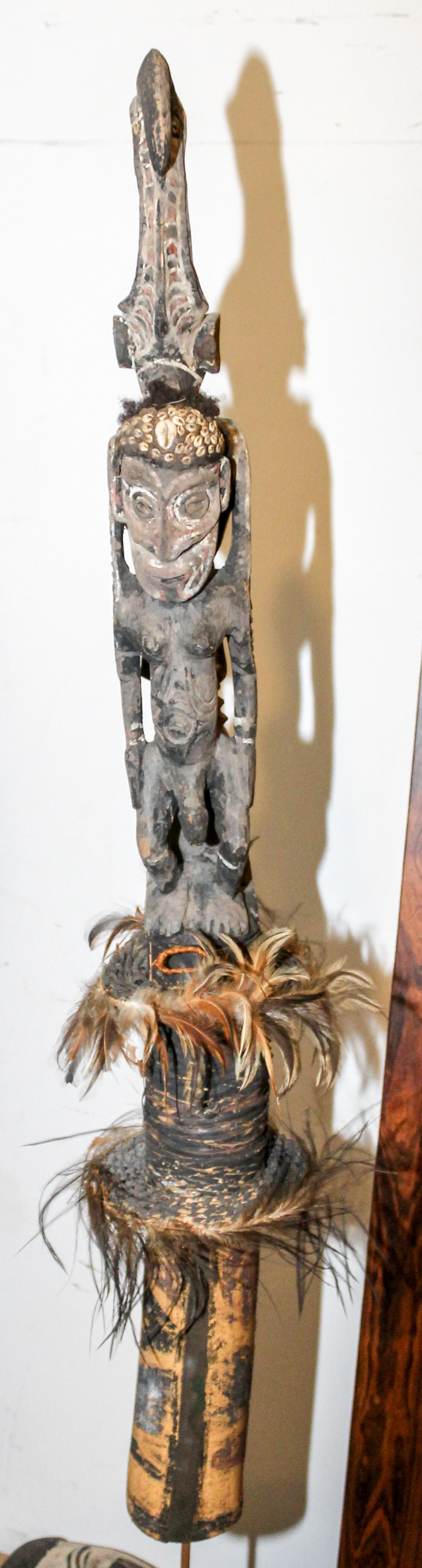 An African Polychrome Figure on Stand. Length 66 inches (overall).