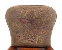 A Queen Anne Volute Carved Walnut Flat-Stretcher Pad-Foot Side Chair
