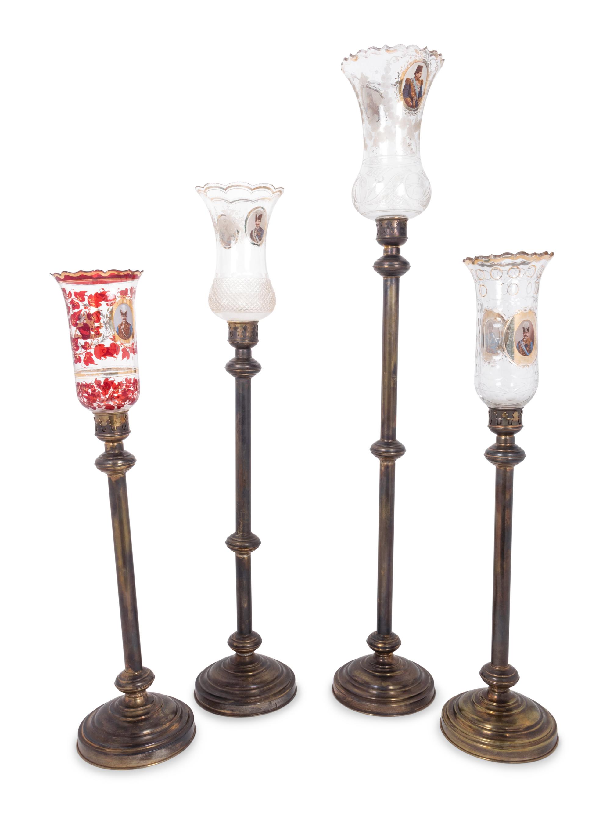 Four Brass and Enameled Glass Hurricane Candlesticks for the Persian Market
