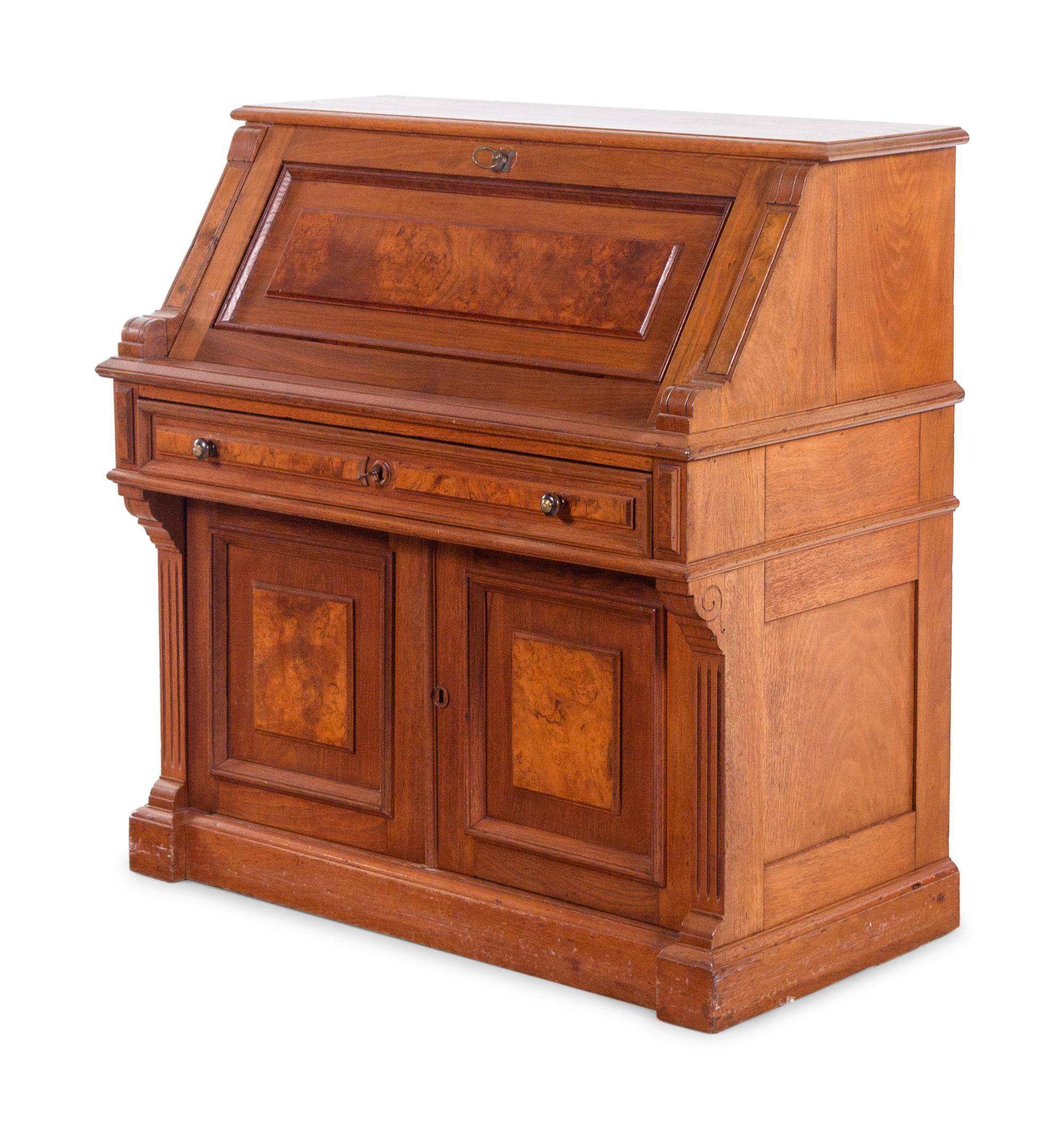 A Victorian Style Walnut Slant-Front Secretary Desk
