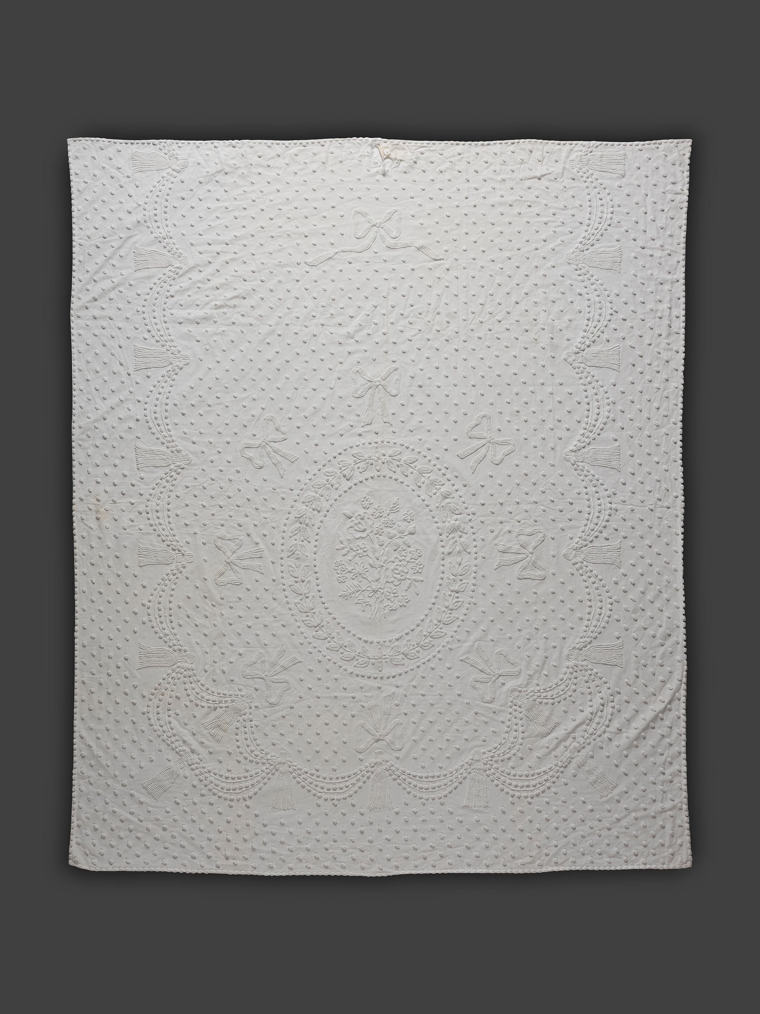 Two Whitework Bed Covers