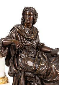A French Gilt and Patinated Bronze Mounted Marble Mantel Clock