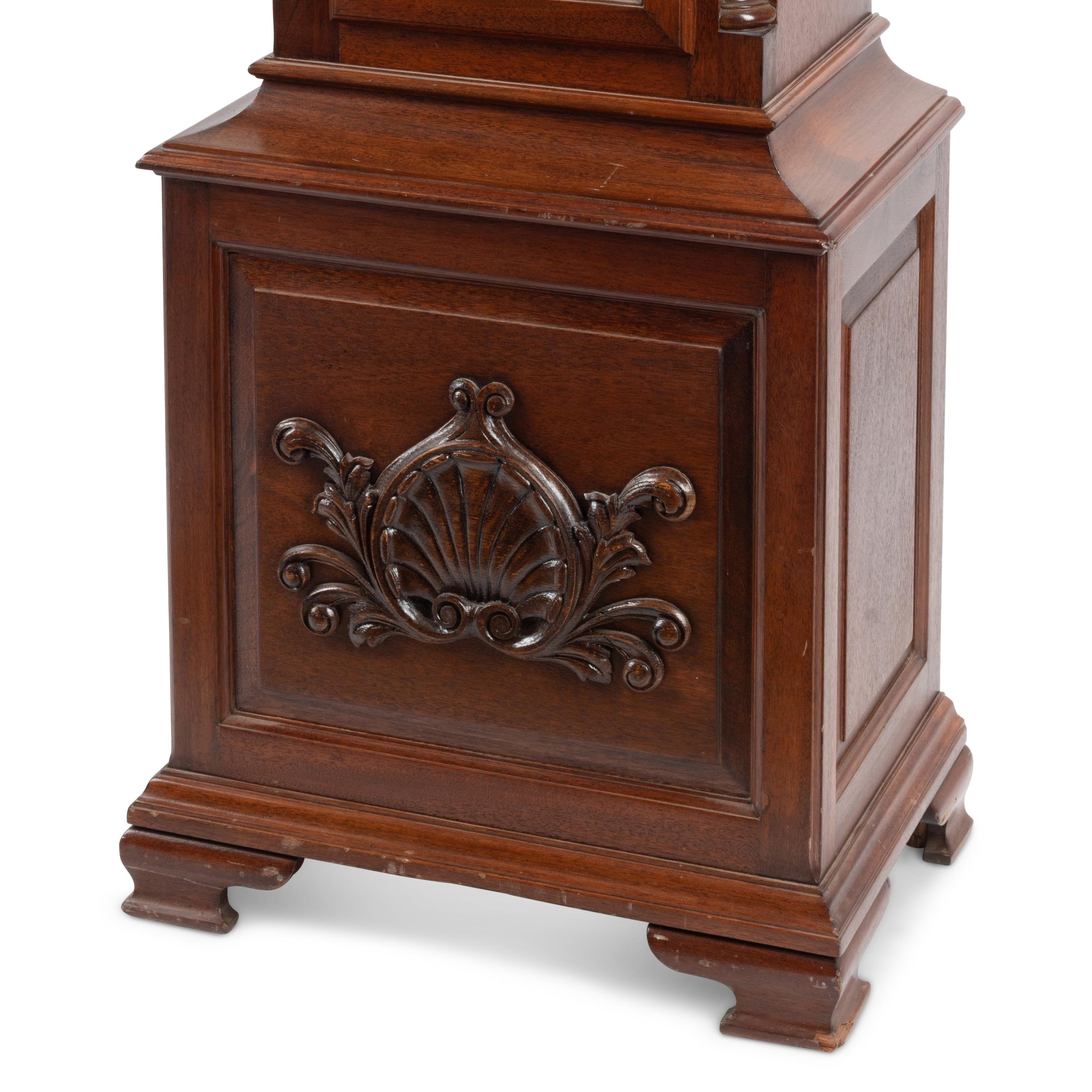 An English Carved Mahogany Tall Case Clock