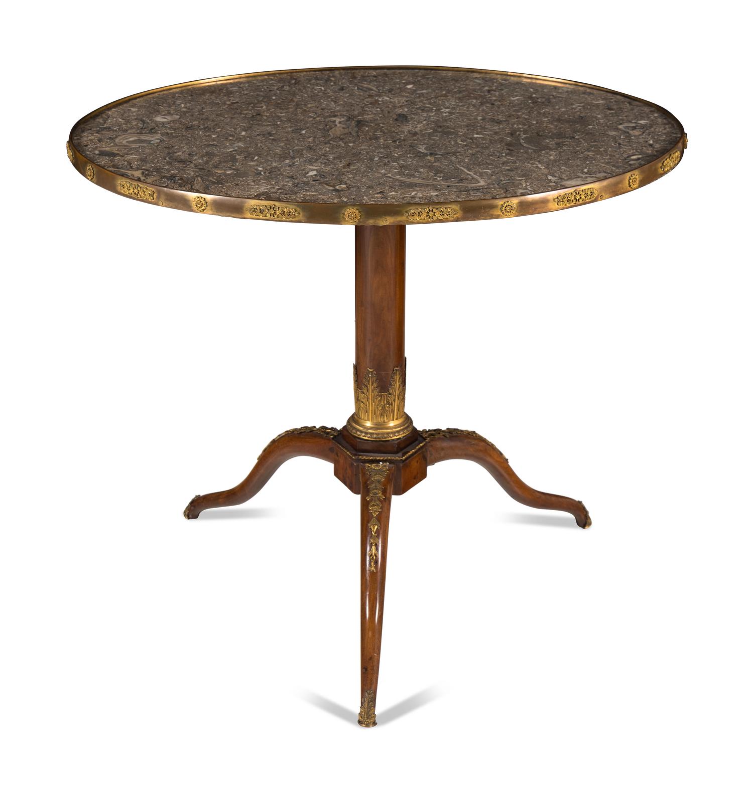 A Louis XVI Gilt Bronze Mounted Mahogany Lumachella Marble-Inset Guéridon