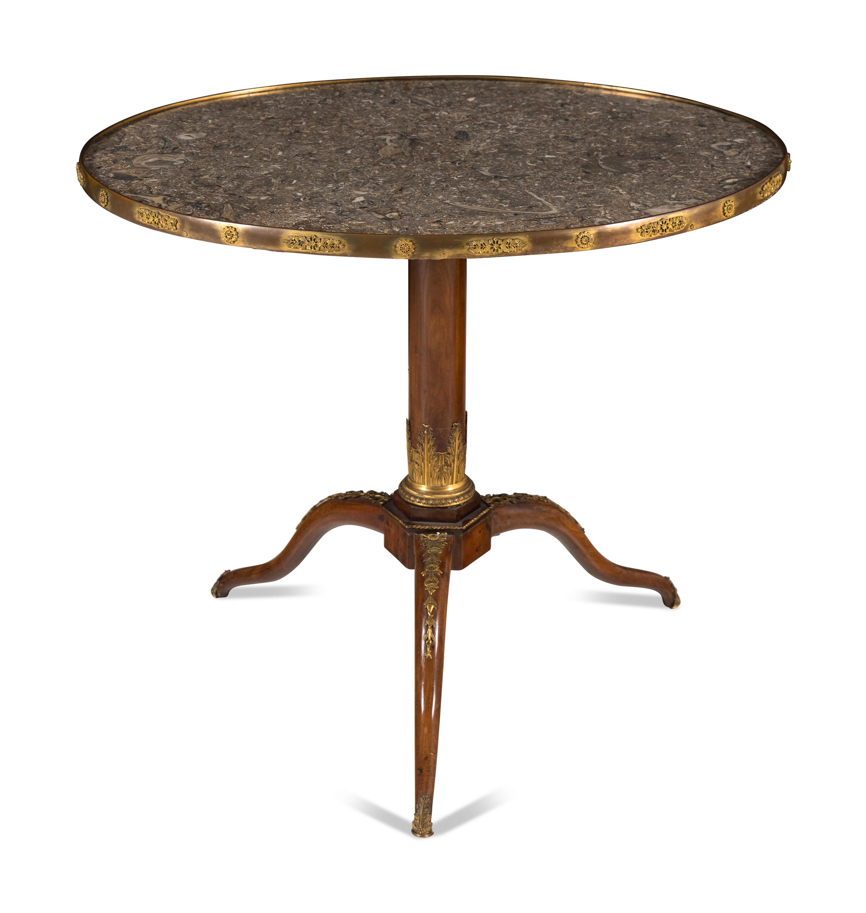 A Louis XVI Gilt Bronze Mounted Mahogany Lumachella Marble-Inset Guéridon