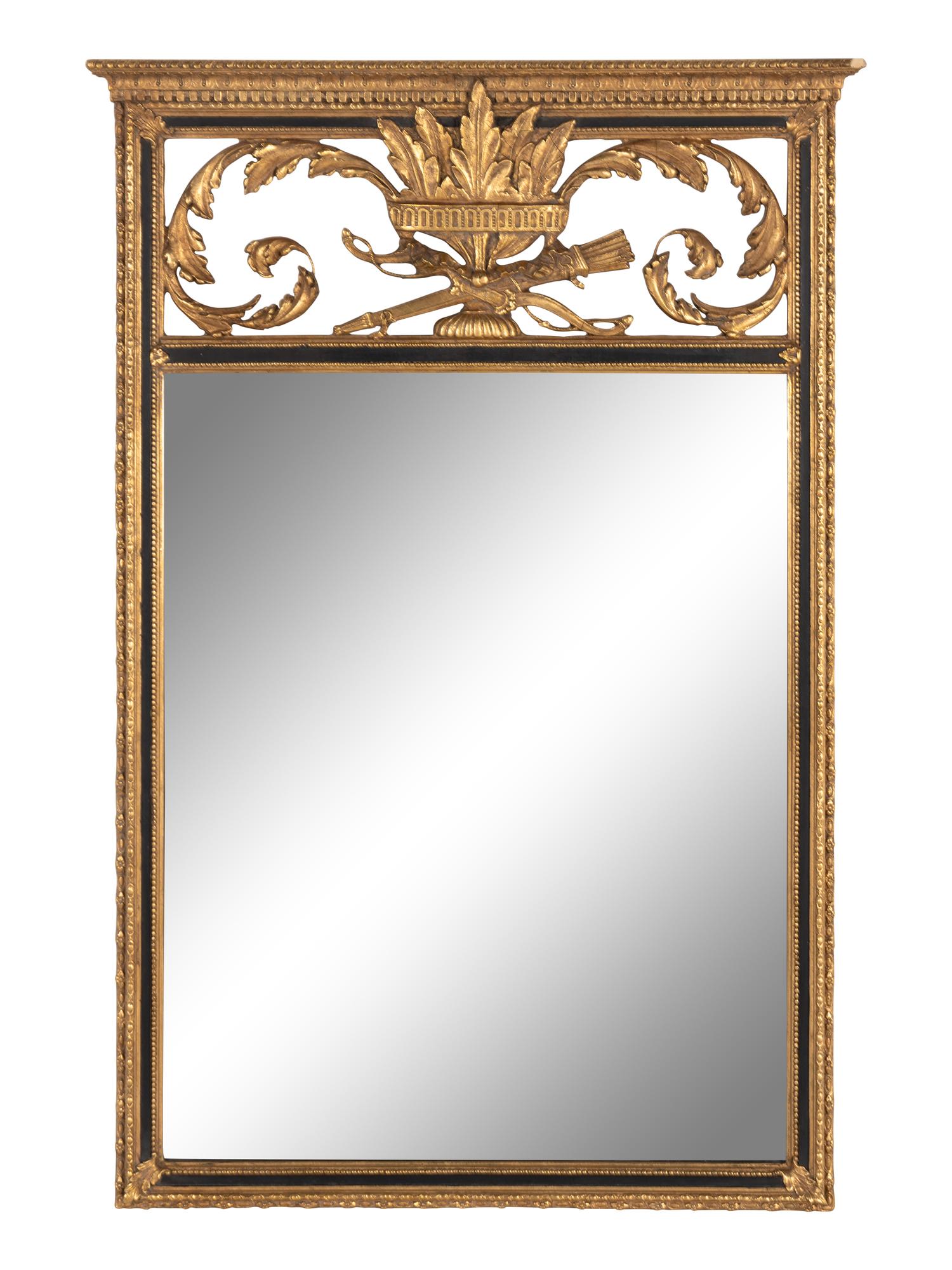 An Empire Style Parcel Ebonized Giltwood Mirror