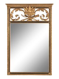 An Empire Style Parcel Ebonized Giltwood Mirror