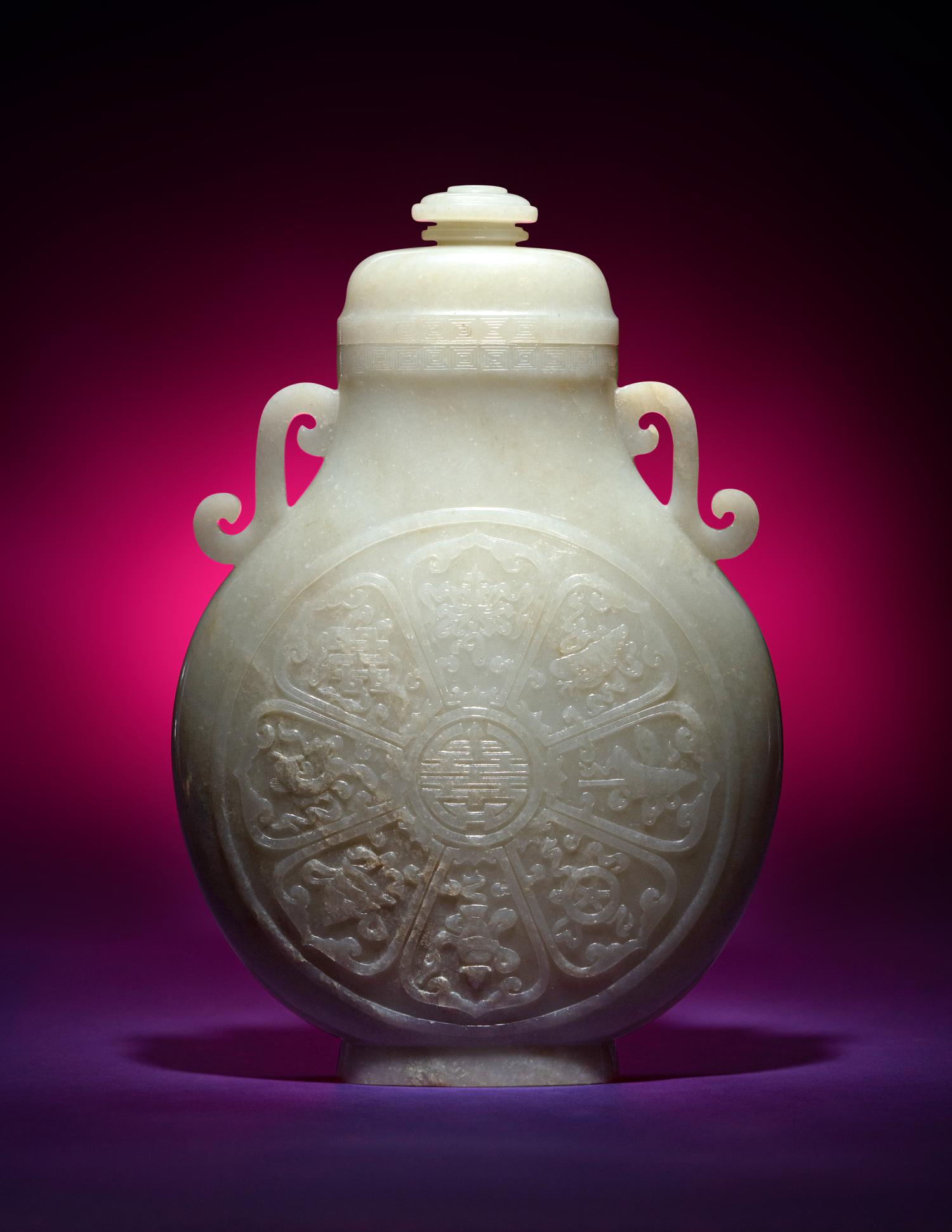 A Rare and Finely Carved Chinese White Jade Covered Vase