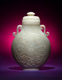 A Rare and Finely Carved Chinese White Jade Covered Vase
