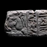 An Egyptian Limestone Stele Fragment