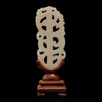 A Chinese white jade "sword" pendant and wood stand 劍形玉飾
