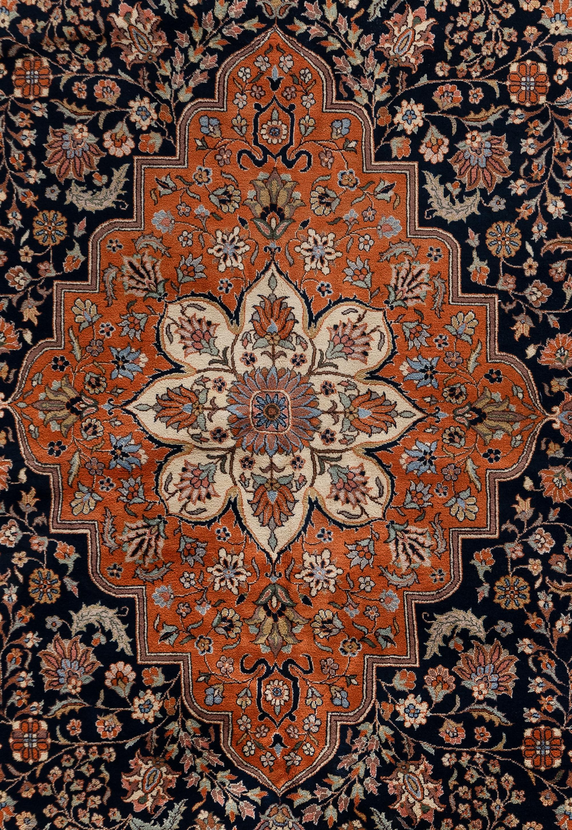 A Romanian Wool Rug of a Farahan Sarouk Design