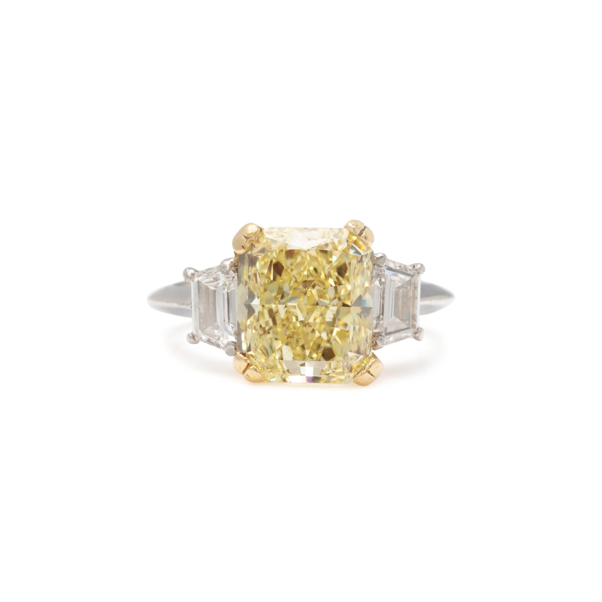 FANCY YELLOW DIAMOND AND DIAMOND RING