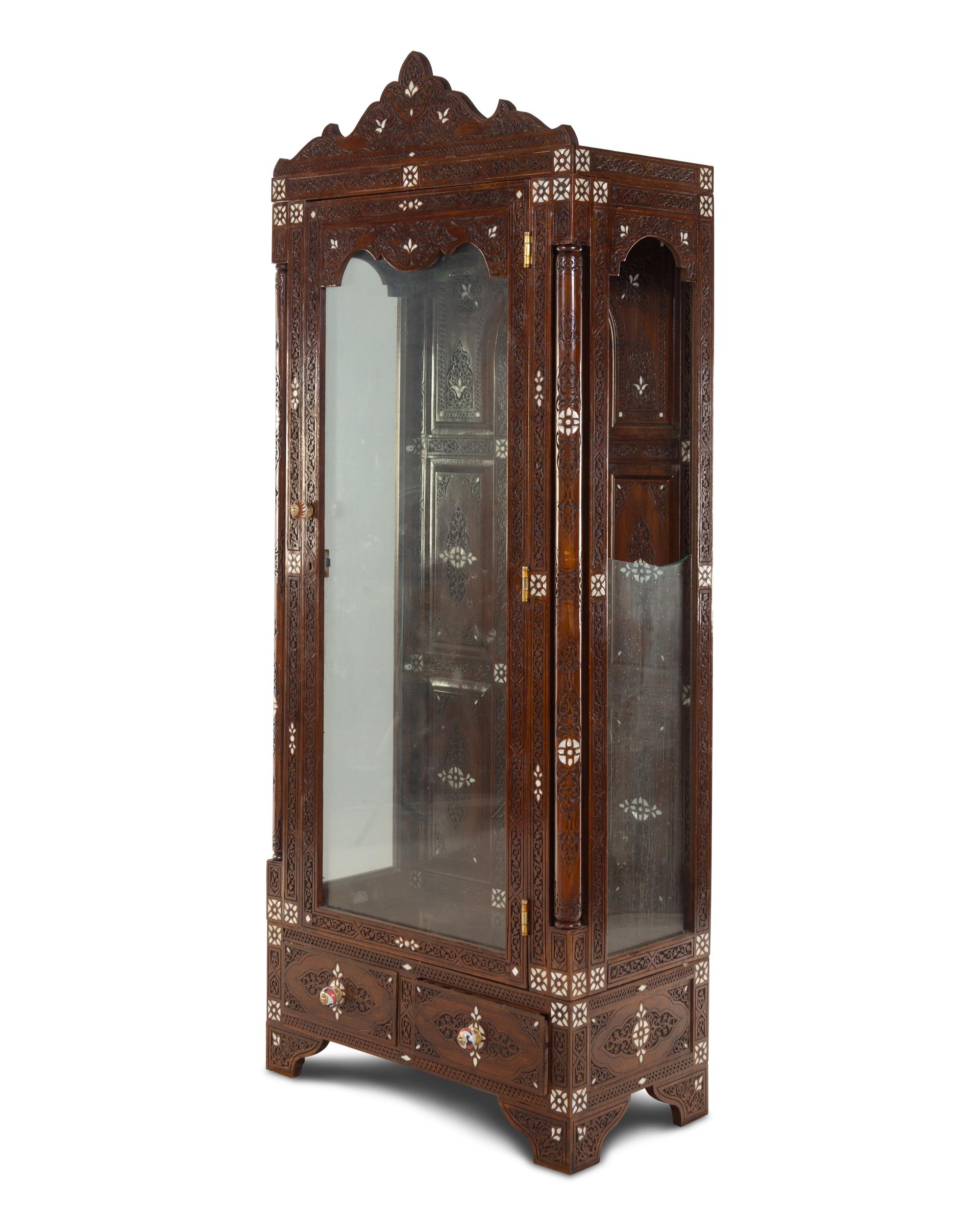 A Syrian Mother-of-Pearl Inlaid and Carved Walnut Vitrine Cabinet
