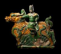 A Large Chinese Sancai Glazed 'Qilin' Roof Tile