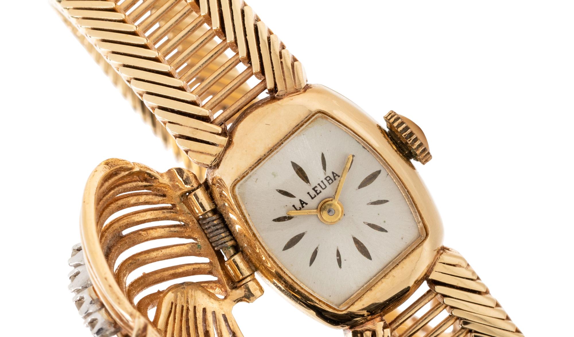 YELLOW GOLD AND DIAMOND SURPRISE WRISTWATCH