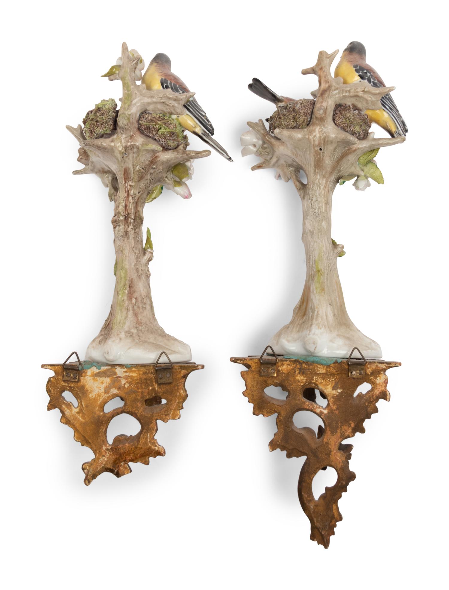 A Pair of Sitzendorf Porcelain Models of Birds with Giltwood Wall Brackets