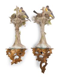 A Pair of Sitzendorf Porcelain Models of Birds with Giltwood Wall Brackets