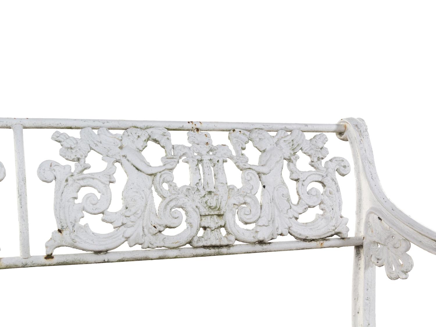 A White Painted Iron Garden Bench and a Pair of Torchères