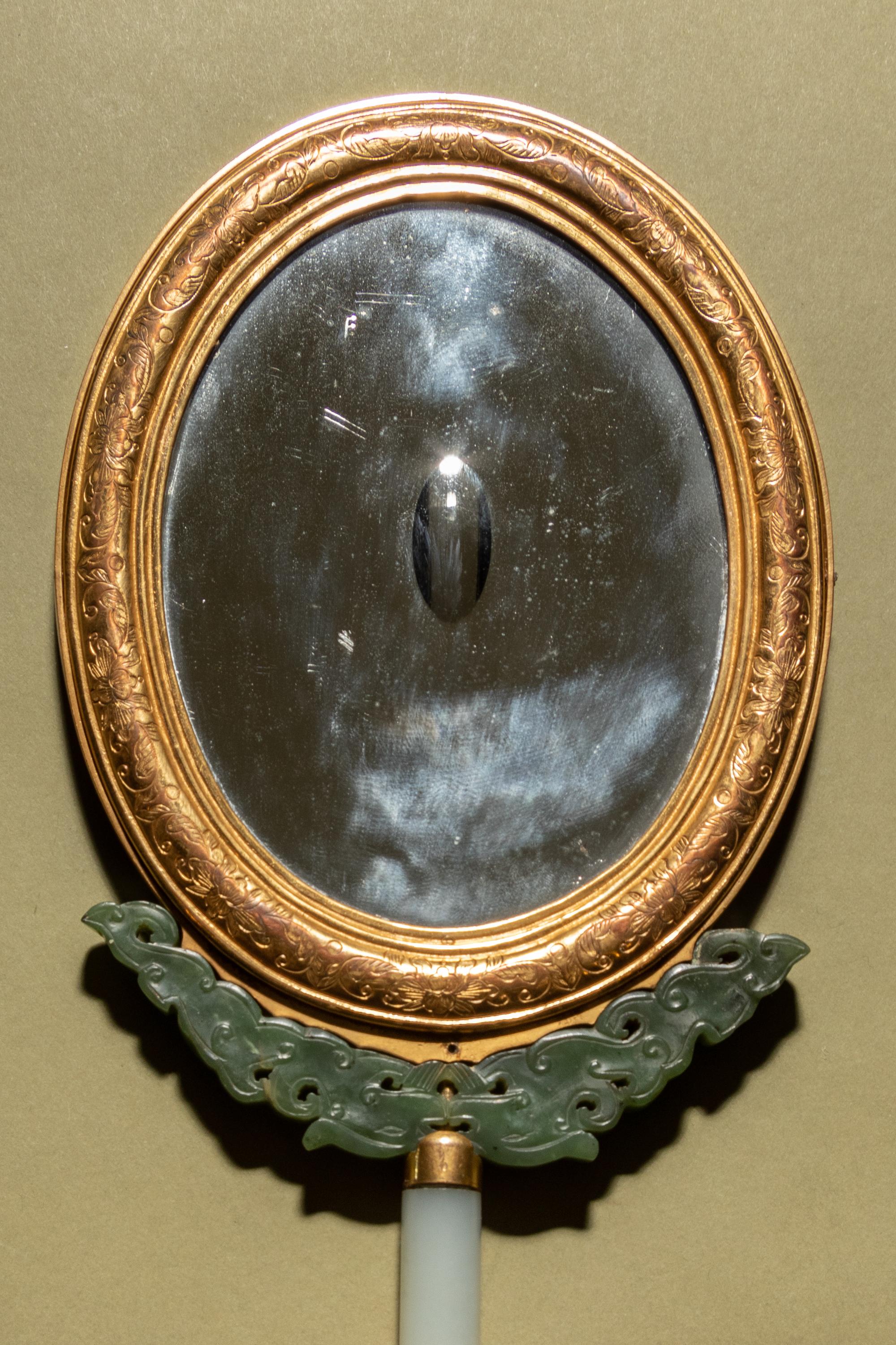 A Painted Enamel and Hardstone Mounted Gilt Metal Hand Mirror