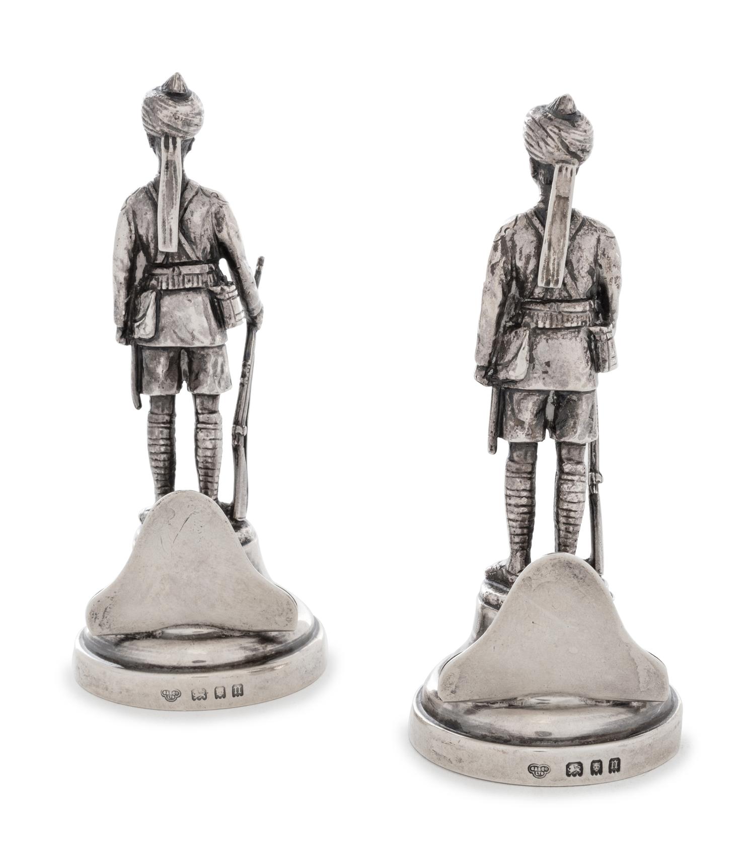 A Pair of Edwardian Silver Figural Menu-Card Holders