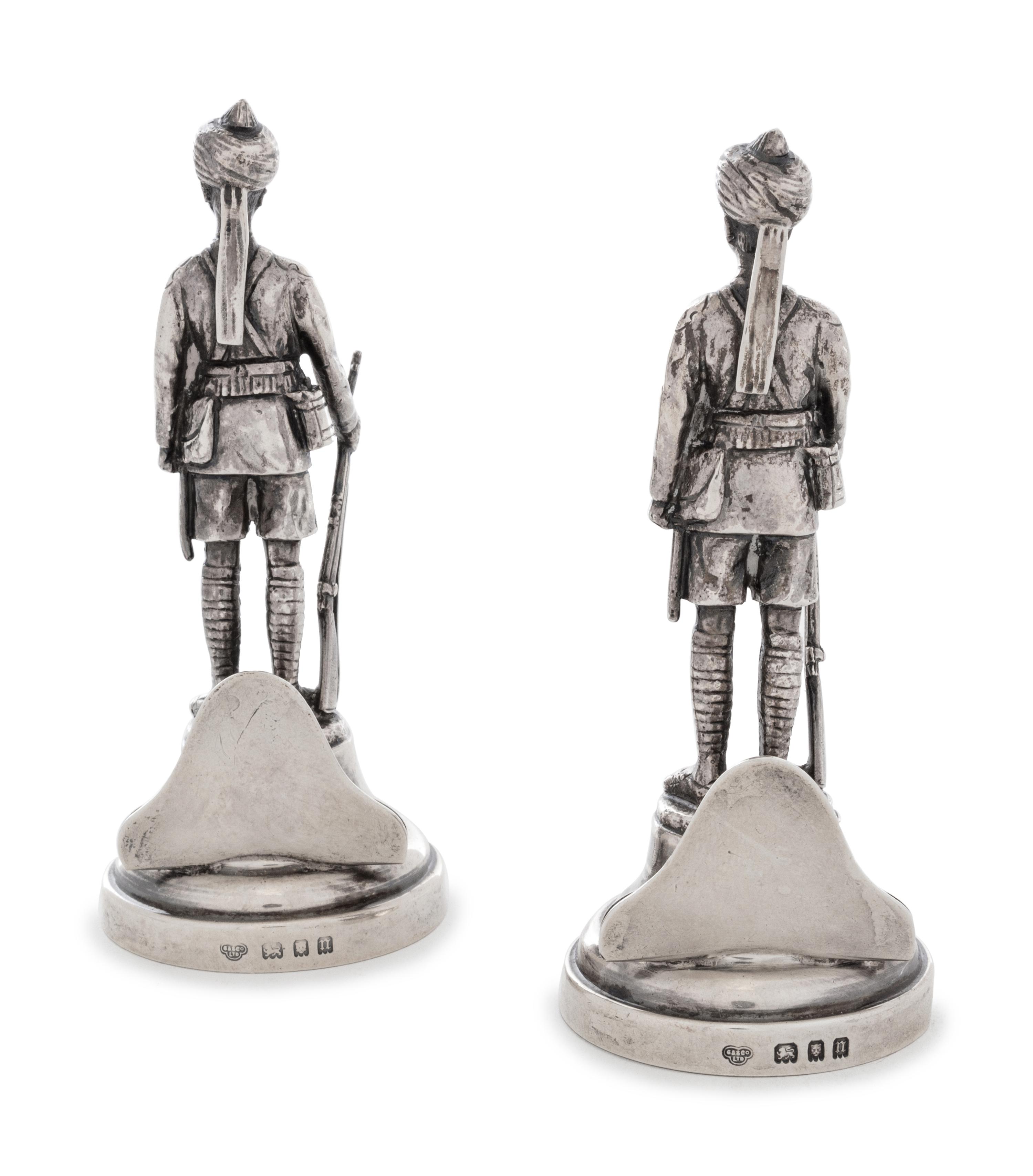 A Pair of Edwardian Silver Figural Menu-Card Holders