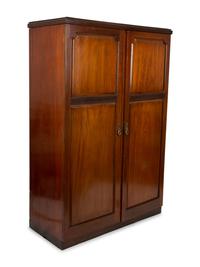 A Mahogany Fitted Gentleman's Wardrobe — EARLY 20TH CENTURY