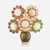 An 18K yellow gold, opal, diamond, emerald, sapphire, and ruby brooch, Julius Hügler Austria