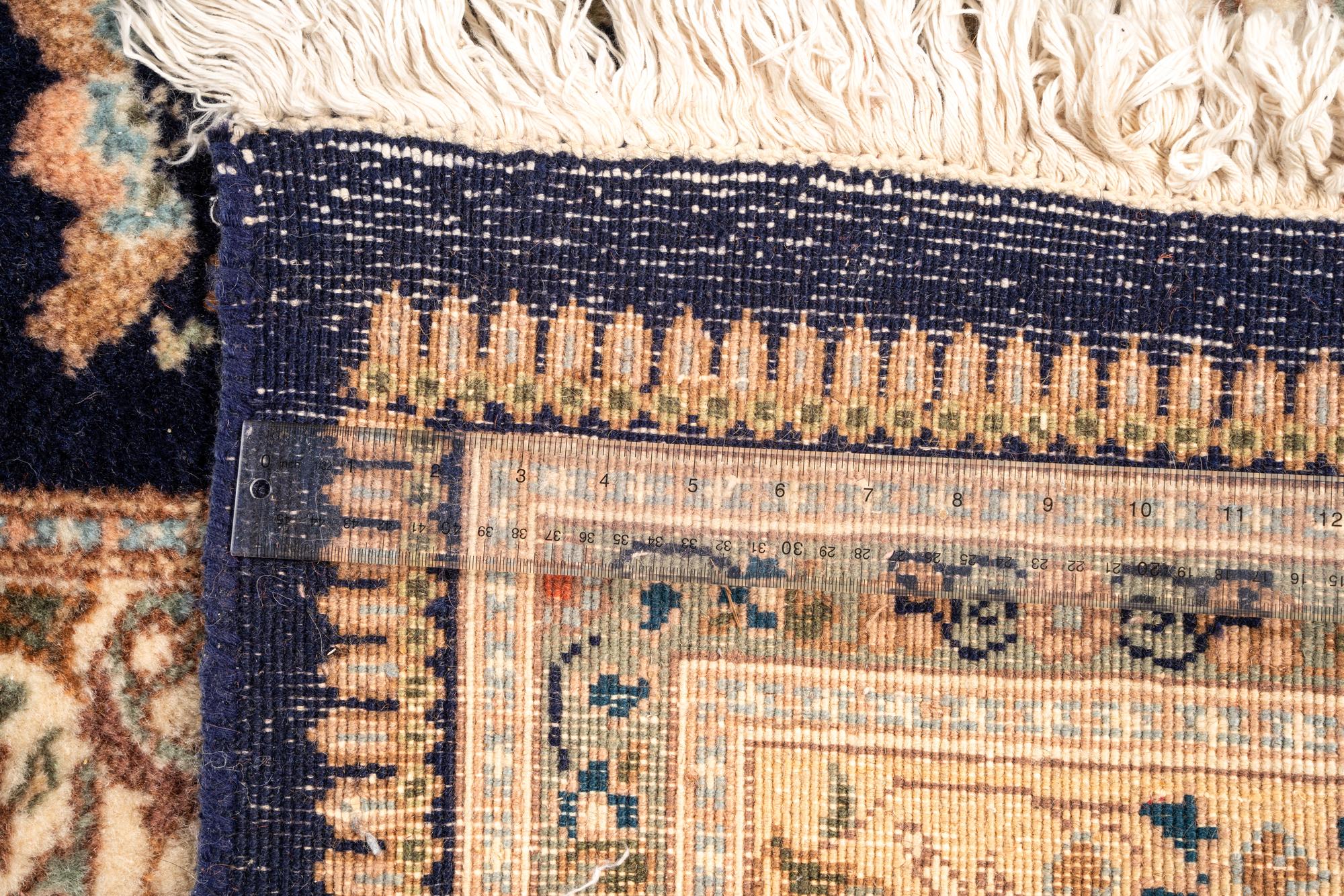 A Tabriz Wool Rug