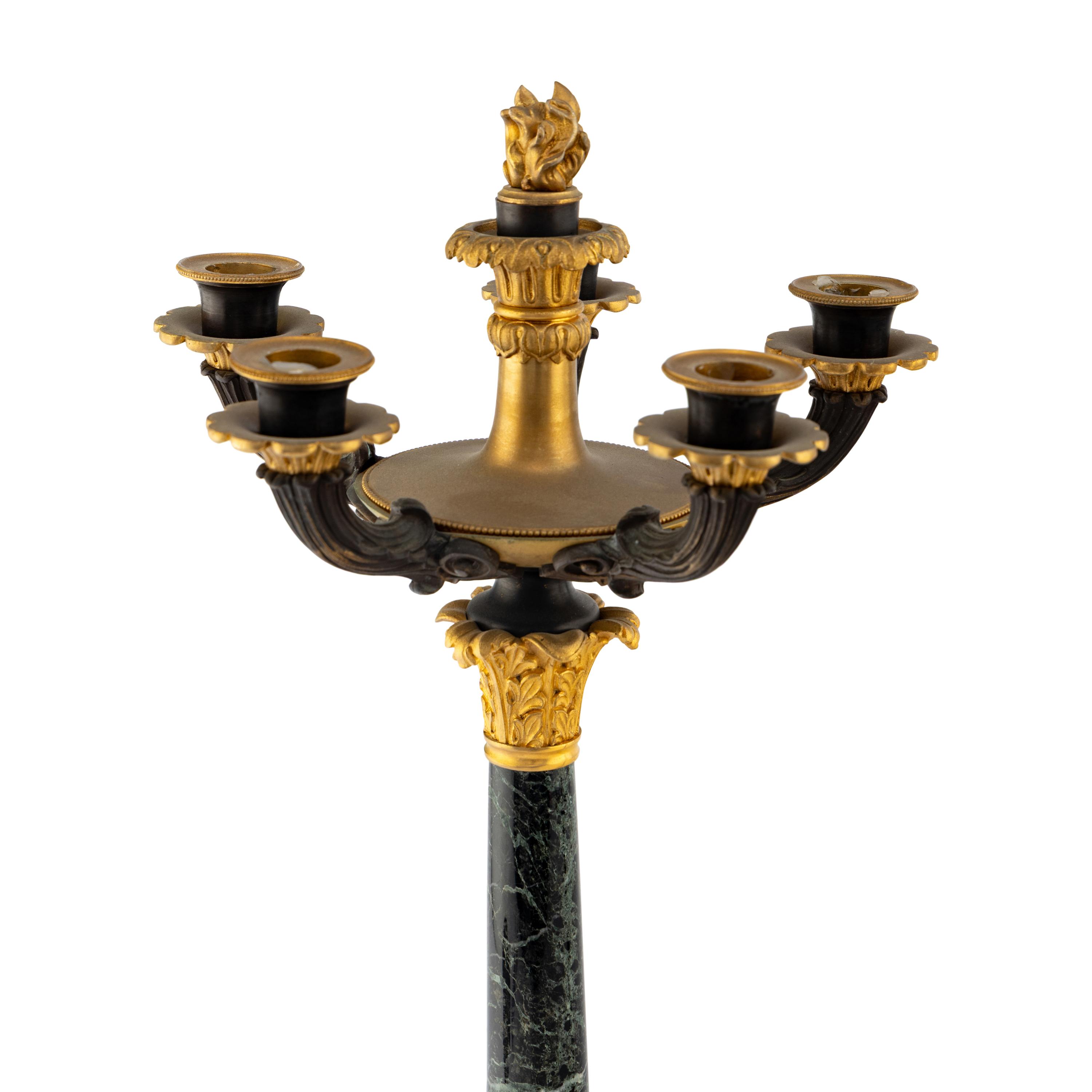A Pair of Charles X Gilt and Patinated Bronze Mounted Marble Seven-Light Candelabra