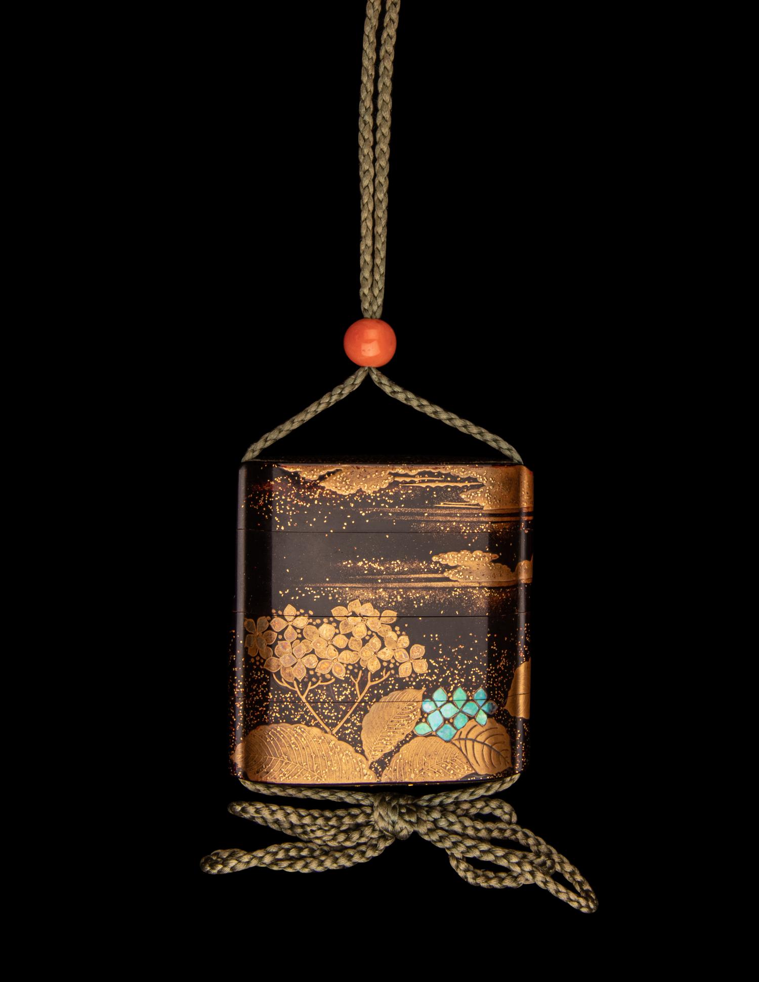 A Japanese Gold and Brown Lacquer Three-Case Inro