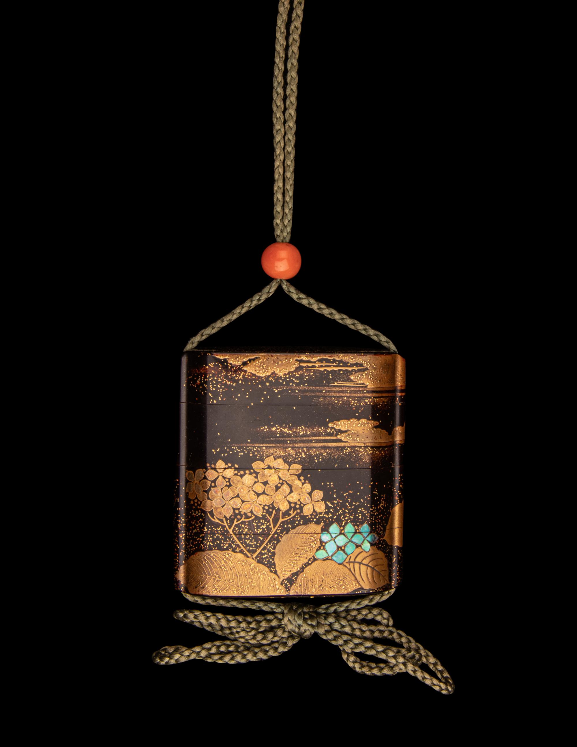 A Japanese Gold and Brown Lacquer Three-Case Inro